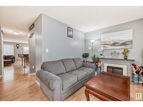 8920 213 St Nw, Edmonton, AB - Indoor Photo Showing Living Room With Fireplace