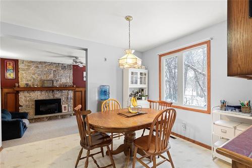 39 Carlotta Crescent, Winnipeg, MB - Indoor Photo Showing Dining Room With Fireplace