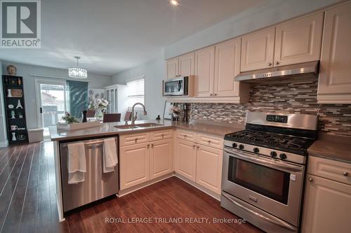 58 Stonehenge Court, London, ON - Indoor Photo Showing Kitchen With Stainless Steel Kitchen With Double Sink