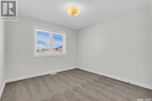 1023 Glacial Shores Common, Saskatoon, SK - Indoor Photo Showing Other Room