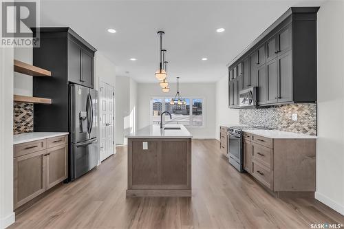 1023 Glacial Shores Common, Saskatoon, SK - Indoor Photo Showing Kitchen With Upgraded Kitchen