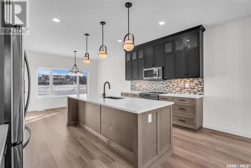 1023 Glacial Shores Common, Saskatoon, SK - Indoor Photo Showing Kitchen With Upgraded Kitchen