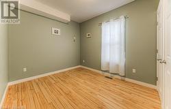 Spare room featuring light hardwood / wood-style floors - 