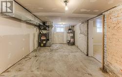 Basement with heating unit and water heater - 