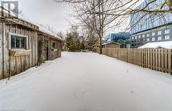 View of yard covered in snow - 