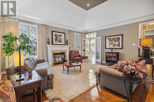 38 Butternut Grove, London, ON - Indoor Photo Showing Living Room With Fireplace