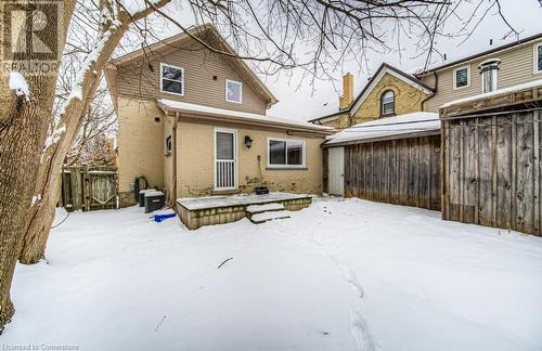 View of snow covered house - 67 Wellington Street N, Kitchener, ON - Outdoor