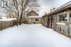 View of yard covered in snow - 