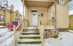 View of snow covered property entrance - 