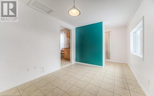 View of tiled spare room - 67 Wellington Street N, Kitchener, ON - Indoor Photo Showing Other Room