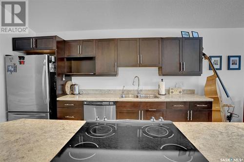 1937 Atkinson Street, Regina, SK - Indoor Photo Showing Kitchen With Double Sink