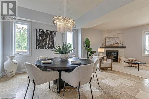 1499 Healy Road, London, ON - Indoor Photo Showing Dining Room With Fireplace