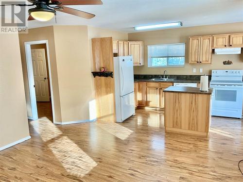 547 Eighth Avenue, Midway, BC - Indoor Photo Showing Kitchen With Double Sink