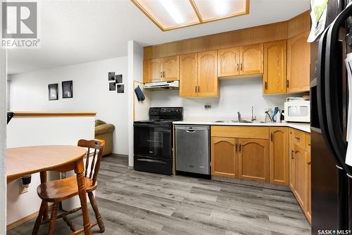 105 2275 Mcintyre Street, Regina, SK - Indoor Photo Showing Kitchen With Double Sink