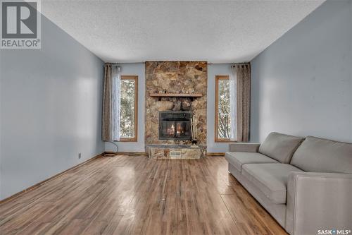 3519 6Th Avenue N, Regina, SK - Indoor Photo Showing Living Room With Fireplace