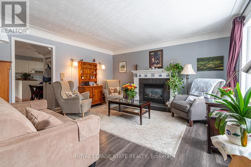 539 Mohawk Road W, Hamilton, ON - Indoor Photo Showing Living Room With Fireplace