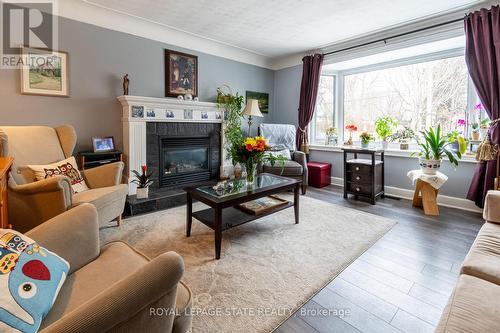 539 Mohawk Road W, Hamilton, ON - Indoor Photo Showing Living Room With Fireplace