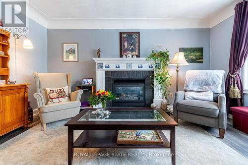 539 Mohawk Road W, Hamilton, ON - Indoor Photo Showing Living Room With Fireplace