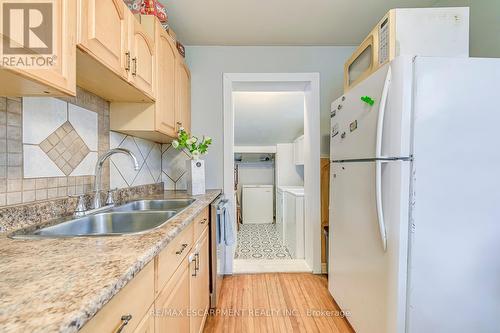 68 East 35Th Street, Hamilton, ON - Indoor Photo Showing Kitchen With Double Sink