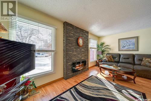 164 Krivel Crescent, Regina, SK - Indoor Photo Showing Living Room With Fireplace