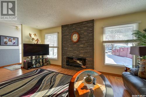 164 Krivel Crescent, Regina, SK - Indoor Photo Showing Living Room With Fireplace