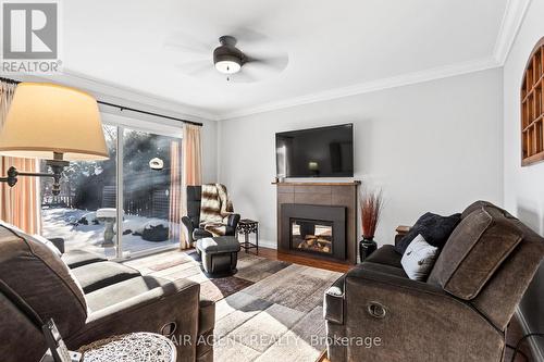 18 Normandy Gardens, London, ON - Indoor Photo Showing Living Room With Fireplace