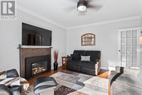 18 Normandy Gardens, London, ON - Indoor Photo Showing Living Room With Fireplace