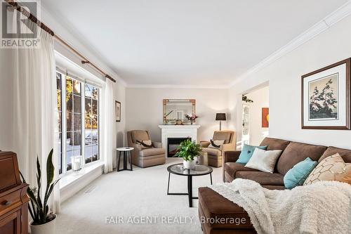 18 Normandy Gardens, London, ON - Indoor Photo Showing Living Room With Fireplace