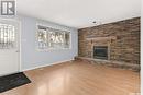 18 Sibbald Crescent, Regina, SK  - Indoor Photo Showing Living Room With Fireplace 