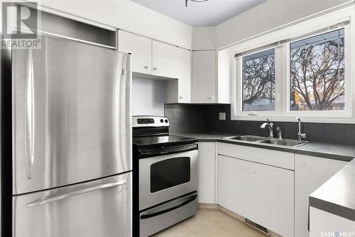 18 Sibbald Crescent, Regina, SK - Indoor Photo Showing Kitchen With Double Sink