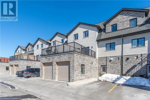 255 Woolwich Street Unit# 203, Waterloo, ON - Outdoor With Balcony With Facade