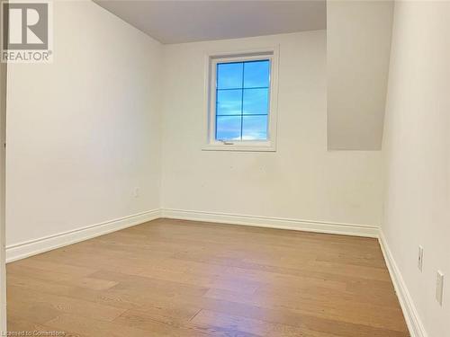 Spare room with light wood-type flooring - 255 Woolwich Street Unit# 203, Waterloo, ON - Indoor Photo Showing Other Room