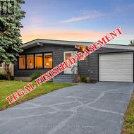 SE - 310 WASCANA CRESCENT  Calgary, AB T2J 1H5