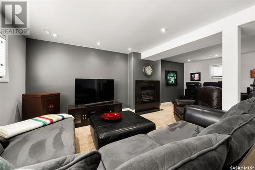 167 Dunsmore Drive, Regina, SK - Indoor Photo Showing Living Room With Fireplace