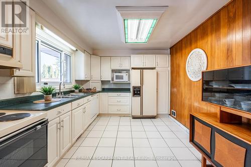 9 Laurier Avenue, Hamilton, ON - Indoor Photo Showing Kitchen With Double Sink