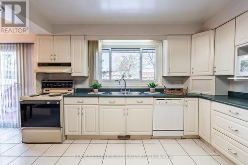 9 Laurier Avenue, Hamilton, ON - Indoor Photo Showing Kitchen With Double Sink