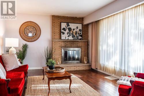 9 Laurier Avenue, Hamilton, ON - Indoor Photo Showing Living Room With Fireplace