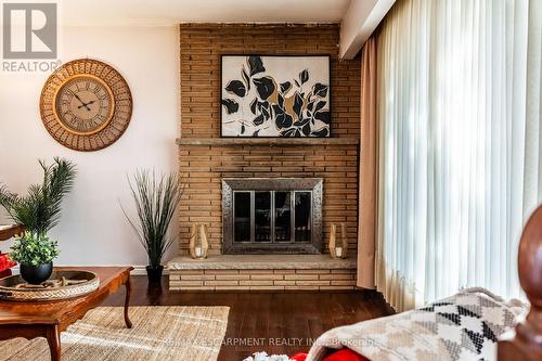 9 Laurier Avenue, Hamilton, ON - Indoor Photo Showing Living Room With Fireplace