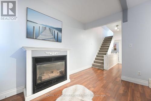 200 Kensington Avenue N, Hamilton, ON - Indoor Photo Showing Living Room With Fireplace