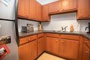 228-1665 Ufton Court, Kelowna, BC  - Indoor Photo Showing Kitchen With Double Sink 