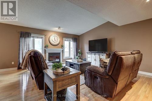 658 North Leaksdale Circle, London, ON - Indoor Photo Showing Living Room With Fireplace