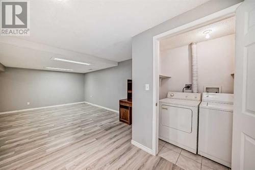 1059 Abbeydale Drive Ne, Calgary, AB - Indoor Photo Showing Laundry Room