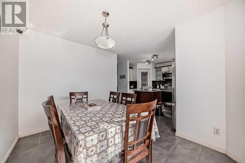 504 Saddlecrest Boulevard Ne, Calgary, AB - Indoor Photo Showing Dining Room