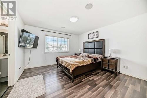 504 Saddlecrest Boulevard Ne, Calgary, AB - Indoor Photo Showing Bedroom