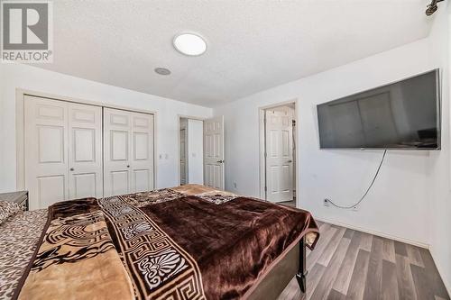 504 Saddlecrest Boulevard Ne, Calgary, AB - Indoor Photo Showing Bedroom