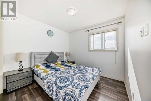 504 Saddlecrest Boulevard Ne, Calgary, AB - Indoor Photo Showing Bedroom