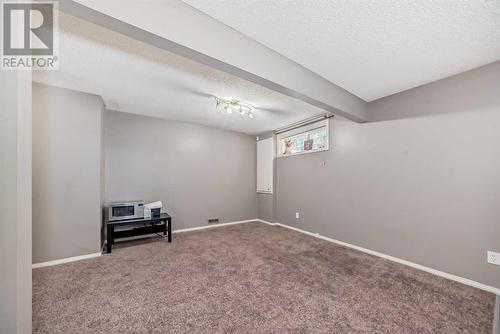 504 Saddlecrest Boulevard Ne, Calgary, AB - Indoor Photo Showing Other Room