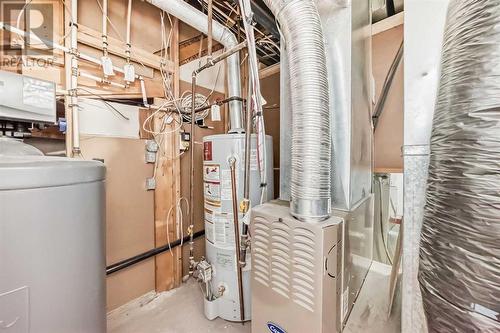 504 Saddlecrest Boulevard Ne, Calgary, AB - Indoor Photo Showing Basement