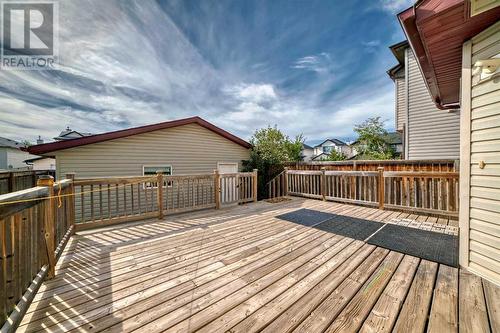 504 Saddlecrest Boulevard Ne, Calgary, AB - Outdoor With Deck Patio Veranda With Exterior