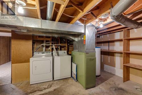 703, 120 Silvercreek Close Nw, Calgary, AB - Indoor Photo Showing Laundry Room